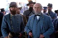 A group of men in blue uniforms standing next to each other.